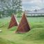 Tipi Nature wooden house կաղապարով փայտից մանկական խաղային տնակ կանաչածածկ տարածքում: