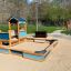 Villa Maxi sandbox with a playhouse խաղահրապարակ՝ փայտե համադրությամբ և կետաձև երեսպատմամբ, բաց արտա